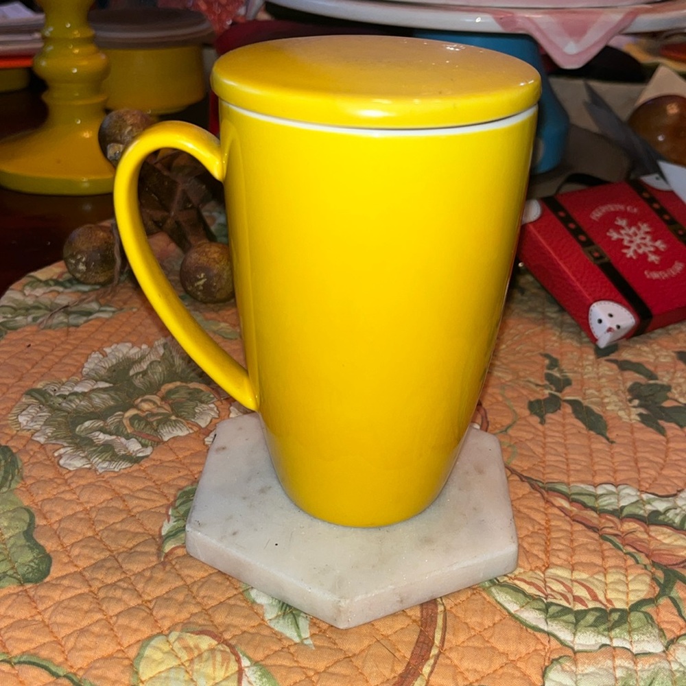 Used Glazed Ceramic tall teacup with cover.
Glazed ceramic yellow